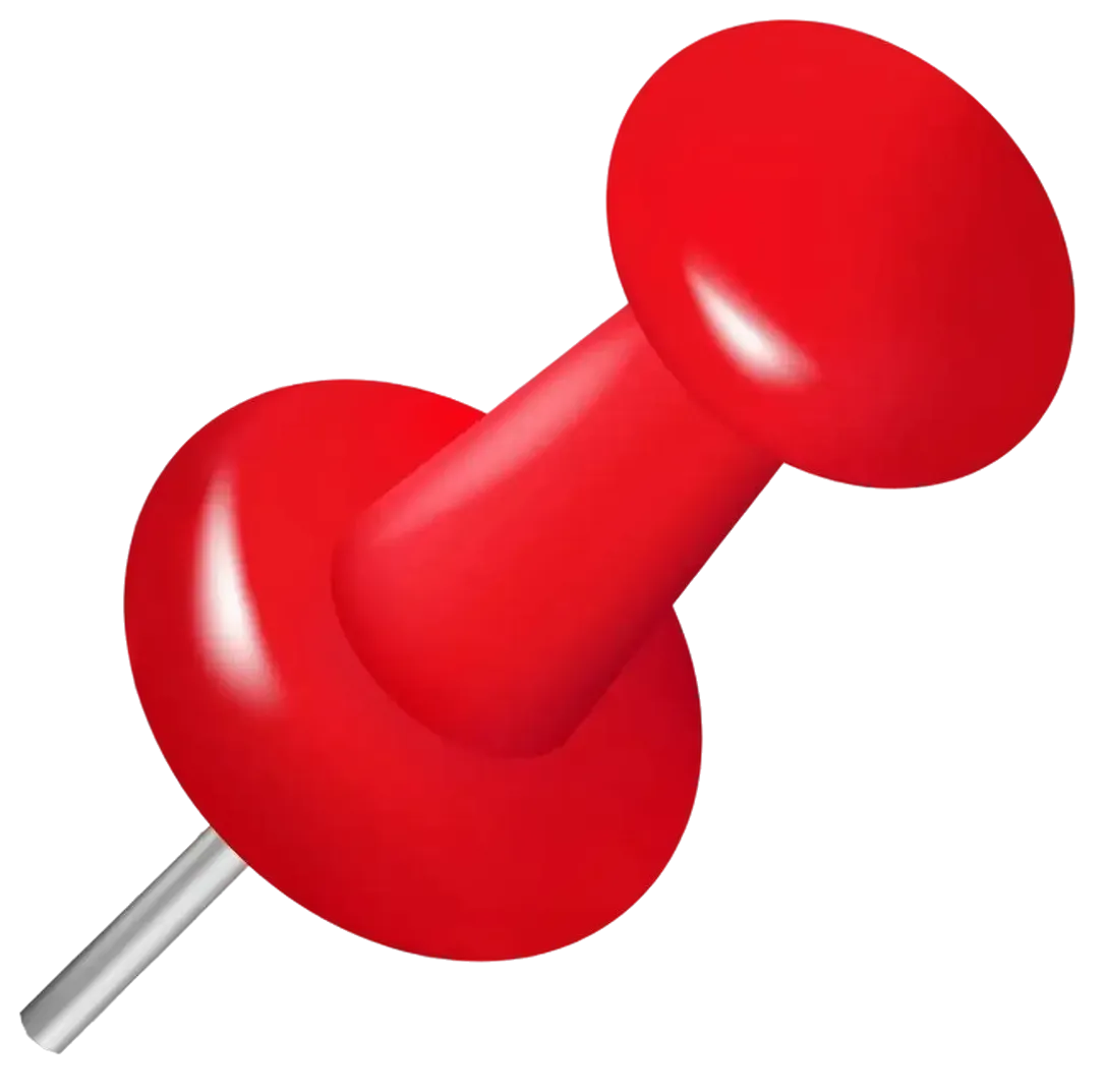Red push pin, angled slightly, with a round head and a metal pin.